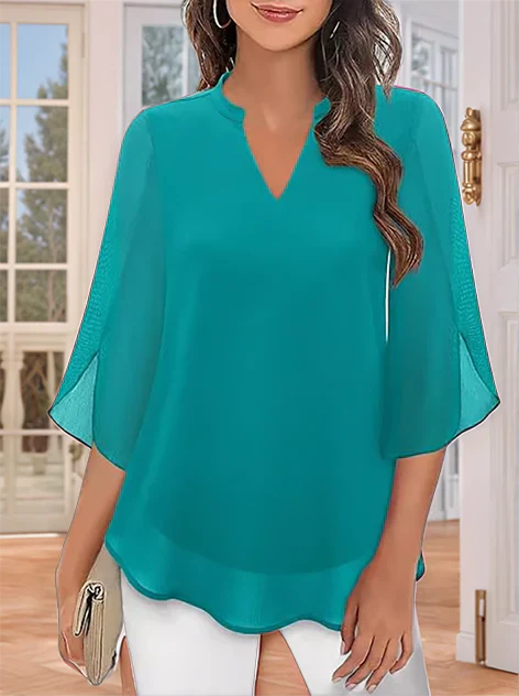 Amaltea – Blusa a Strati Elegante